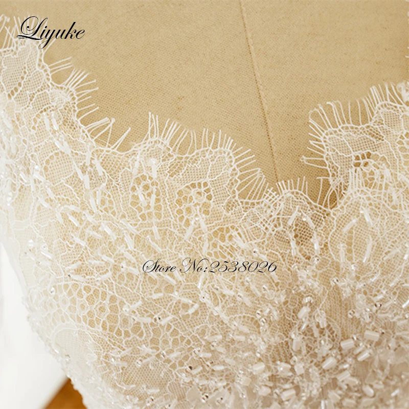 Простое свадебное платье-трапеция Liyuke с V-образным вырезом и кристаллами цвета