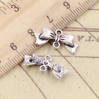 30pcs charms bowknot bow 20x9mm tibetan bronze silver color pendants antique jewelry making diy handmade craft