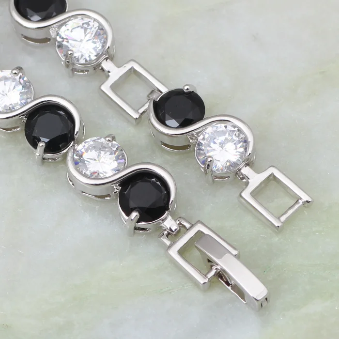 Бижутерия оптом и в розницу белого черного цвета с украшением виде кристаллов
