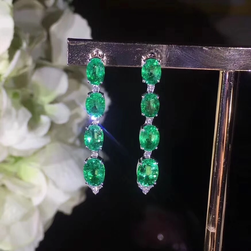 

Серьги-подвески из серебра 925 пробы с натуральным зеленым изумрудом