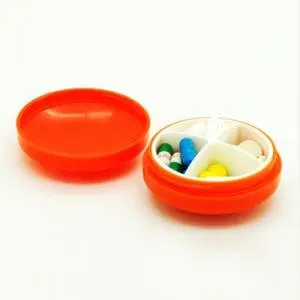 

Creative round personality carry 4 grid kit pill box high quality 6.5*3.4cm free shipping