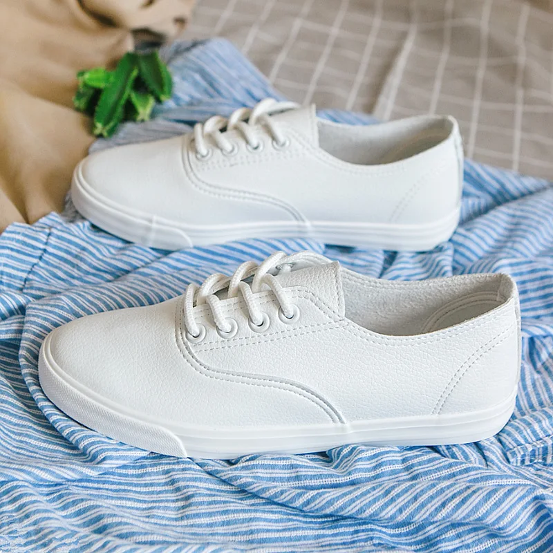 Кроссовки женские на шнуровке базовые кожаные плоской подошве