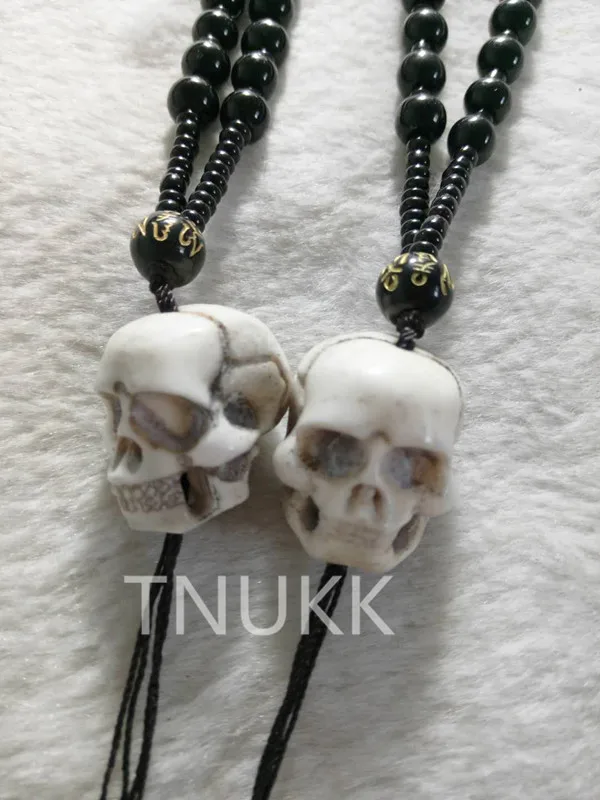 

Exquisite carvings of natural materials, authentic deer bones, head pendants