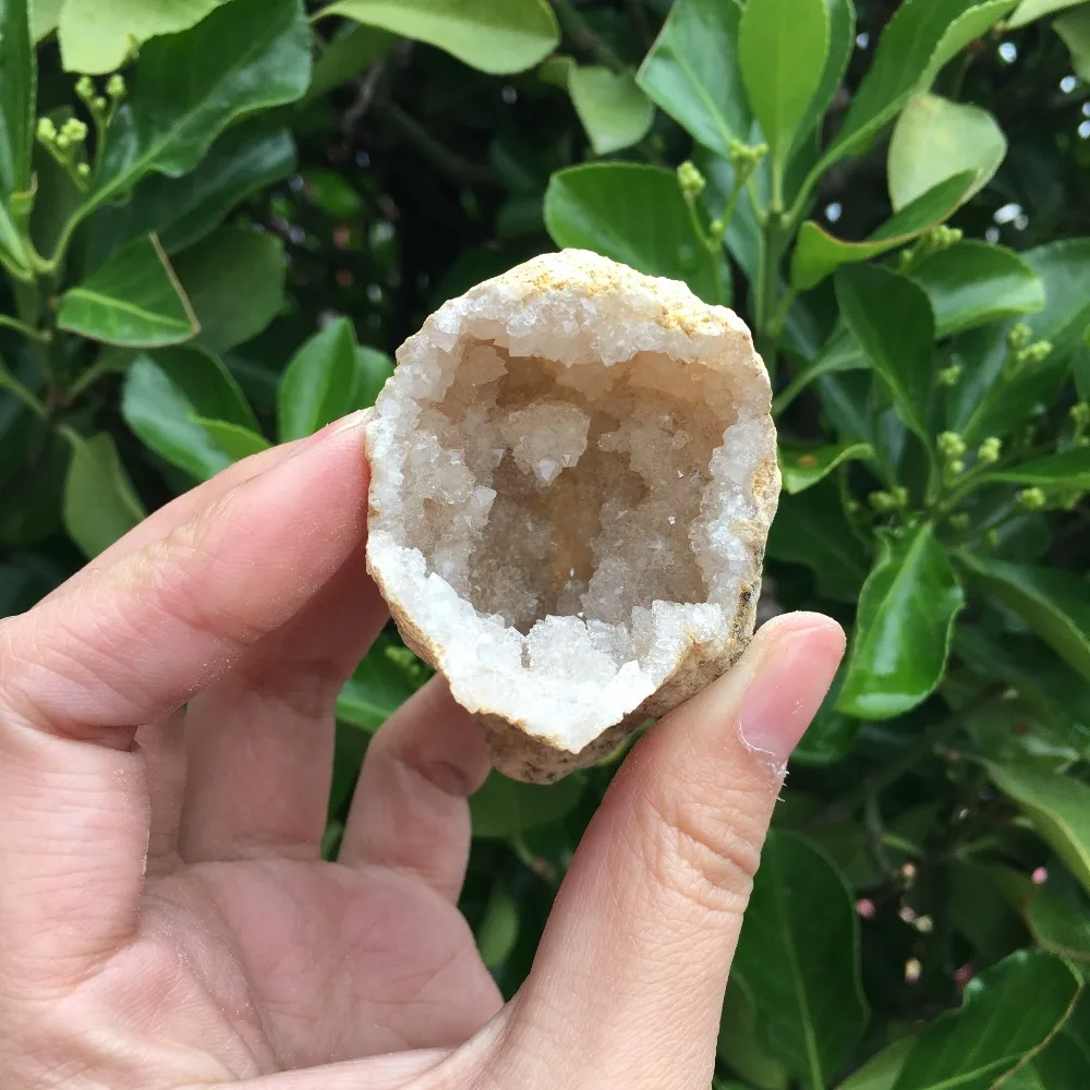 

Natural agate geode crystal hole Mineral specimen contains clean crystal clusters of very beautiful small stones and crystals