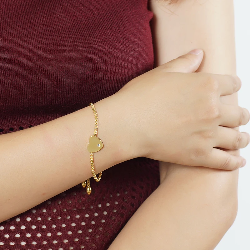 Женский браслет из нержавеющей стали под розовое золото с подвеской в виде