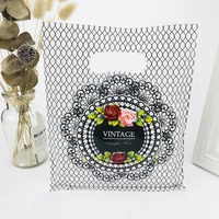 100pcs 20x25cm grid flower design plastic gift bags favor jewelry boutique gift packaging plastic shopping bag with handle