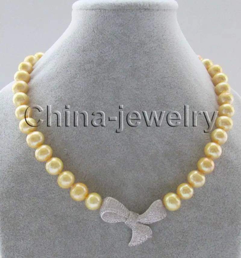 

P7341-18" 10-11mm natural gold round freshwater pearl necklace - Bowknot pendant>>> free shipping