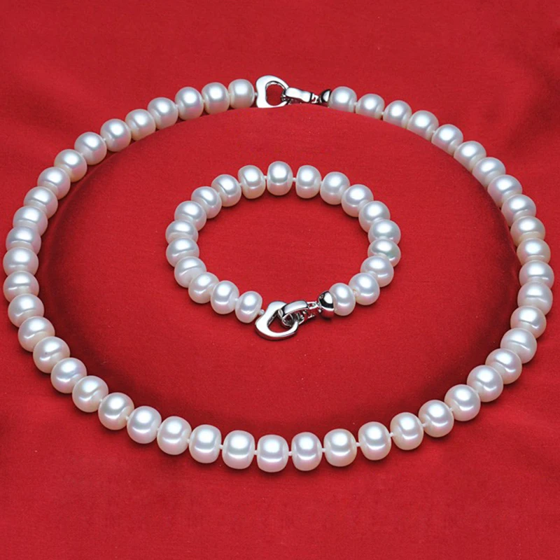 Комплект из колье и серёг серебра 2017 пробы с натуральным пресноводным жемчугом |