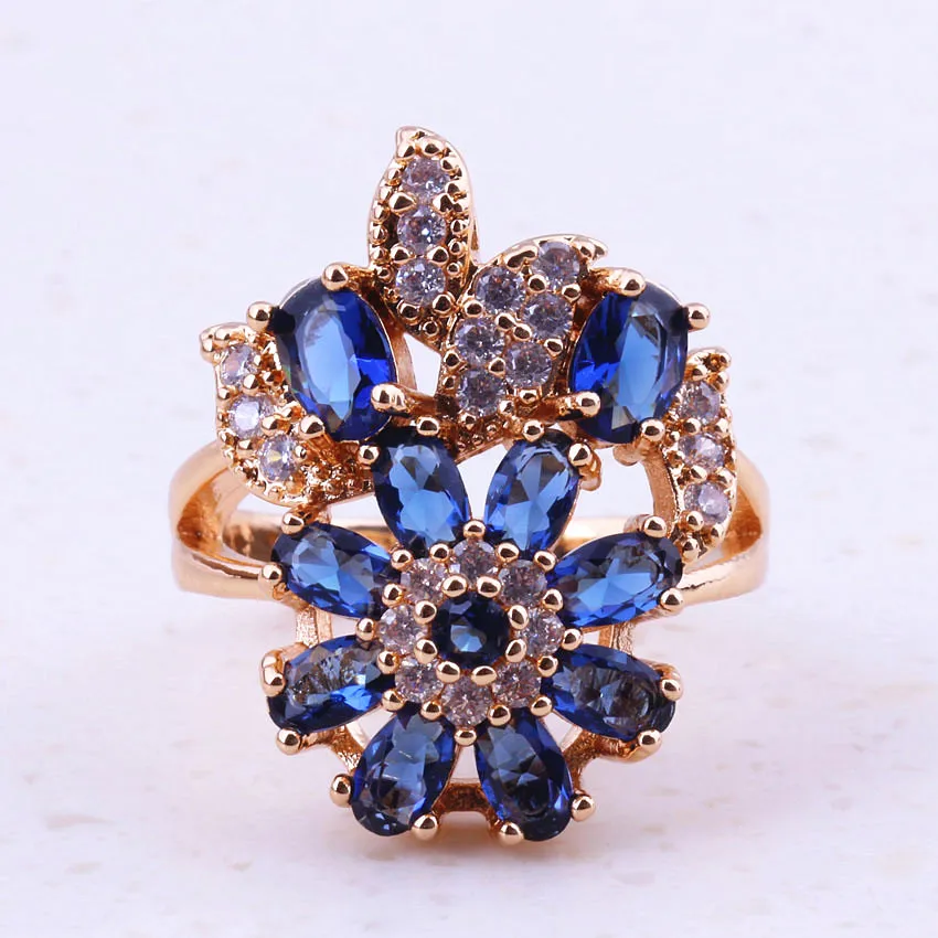 Женское кольцо с фианитом элегантное желтого золота имитацией синего кристалла