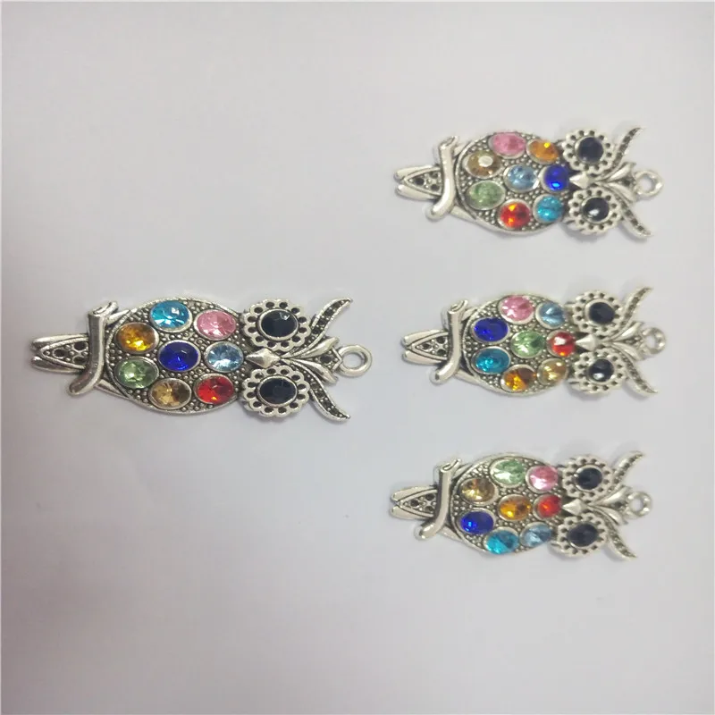 Ожерелье с подвеской в виде совы серебристого цвета 45 х24 мм 8 шт./лот стразы 08438 |