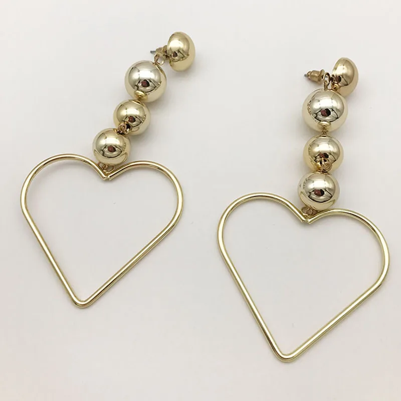 

Big heart-shaped golden drop earrings Shiny metal charm earring Punk style earrings fine jewelry women accessories
