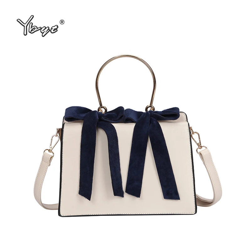 Женская сумка ранец с круглой металлической ручкой мессенджеры на плечо