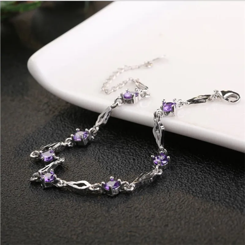 Женский браслет из серебра 925 пробы с фиолетовыми кристаллами - купить по