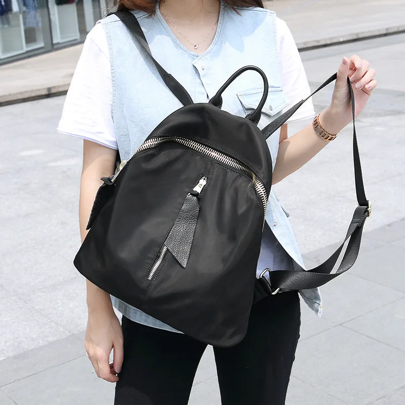 Женские рюкзаки черного цвета с заклепками повседневные однотонные нейлоновый