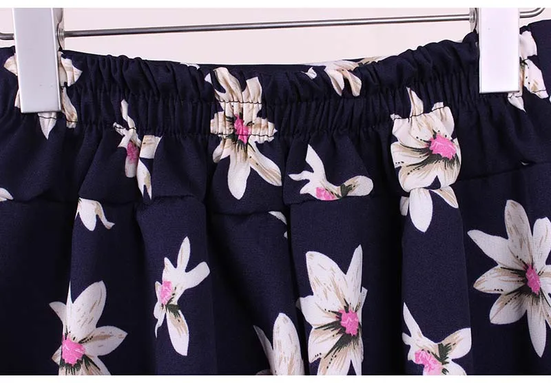 Оптовая продажа Модные женские плиссированные мини юбки с цветочным узором