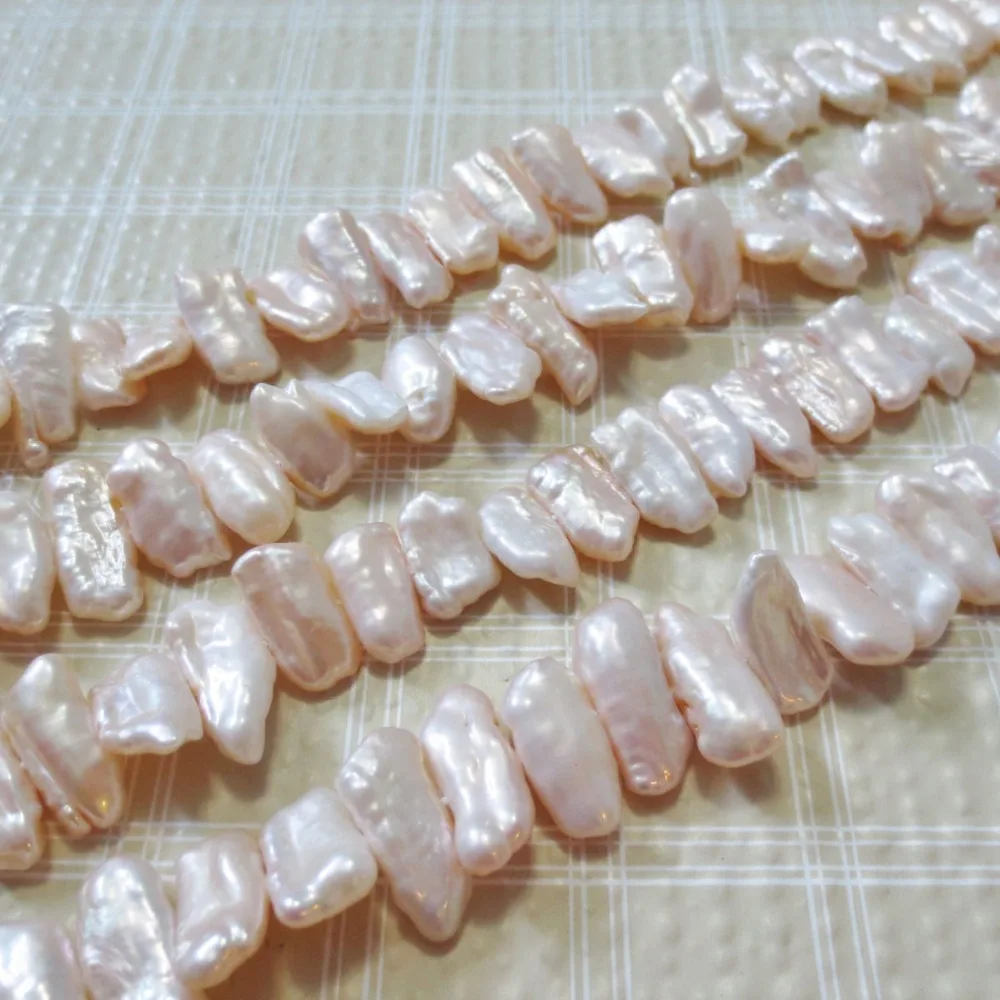 

Women's 7x20mm Cream Biwa Freshwater pearls beads