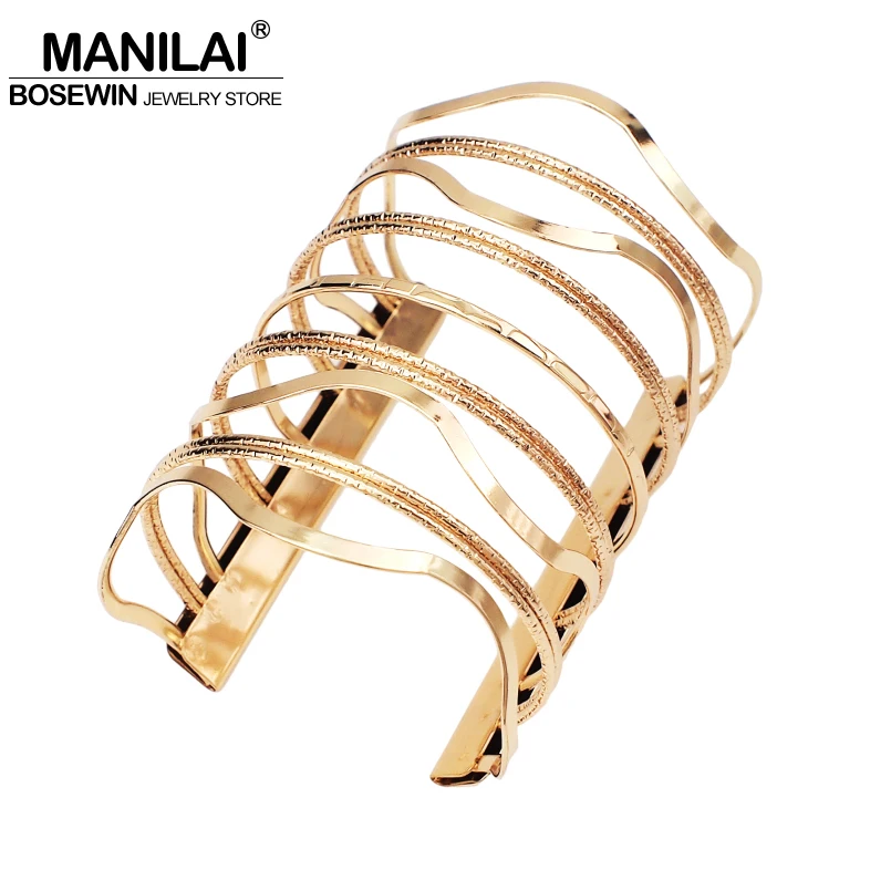 Женский браслет с волнистым узором MANILAI большой металлический на запястье из