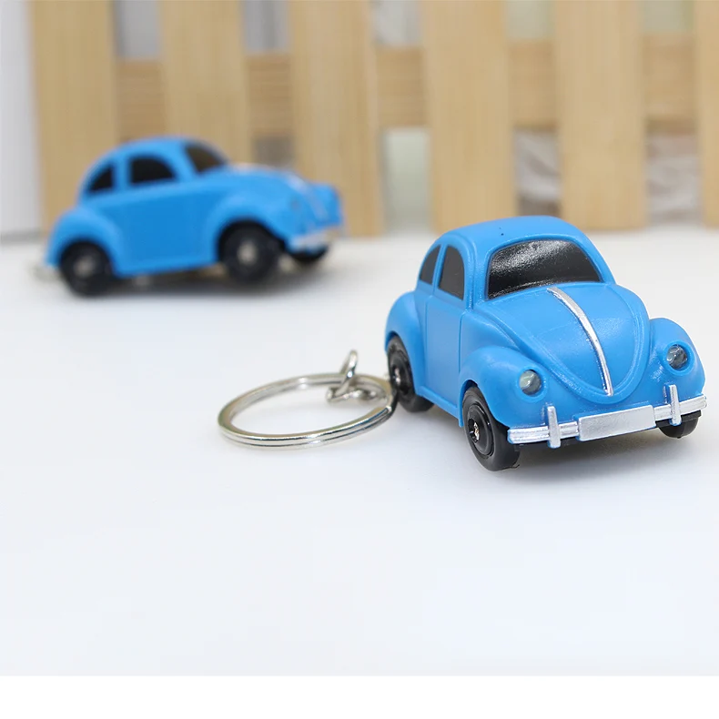 С гальваническим покрытием спортивный автомобиль светодиодный вспышки света для цепочек для ключей, сумок, Модный кулон в виде и автомобильные часы со звуком мастер Эфирное ювелирные кольца для ключей на автомобили, магазин