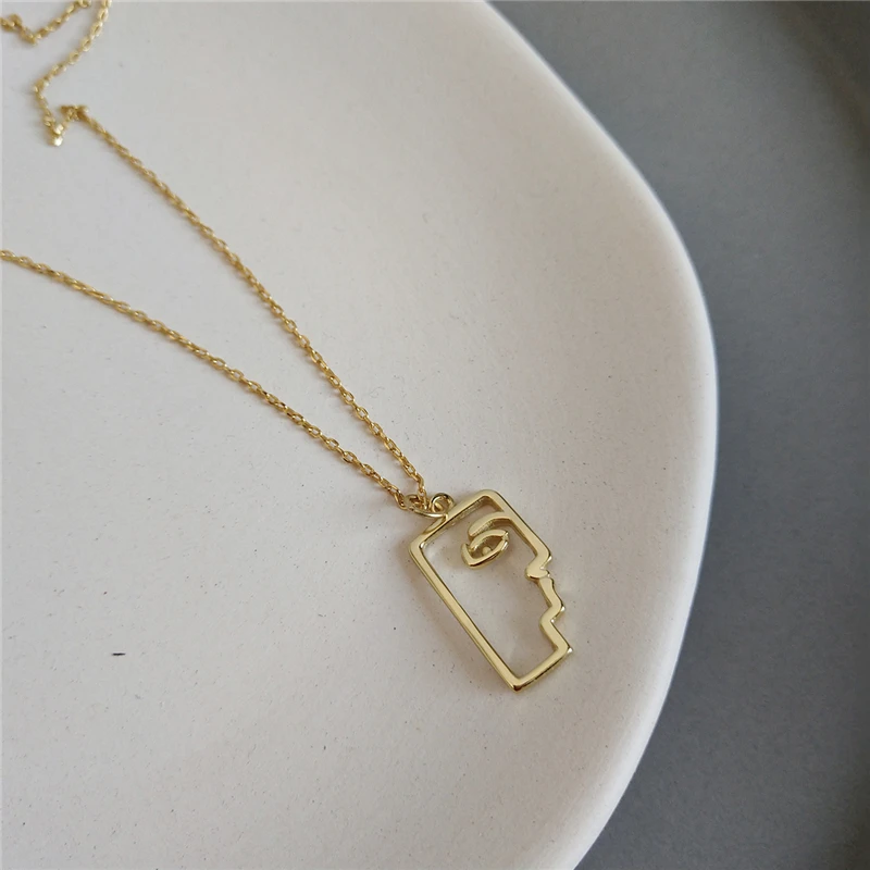 Женское колье-чокер из серебра 925 пробы с подвеской в виде половинчатого