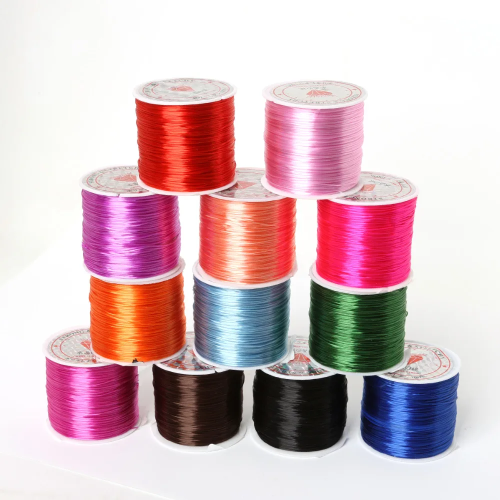 Тянущаяся прозрачная проволока с кристаллами 8 цветов м/рулон 0 7 мм эластичная