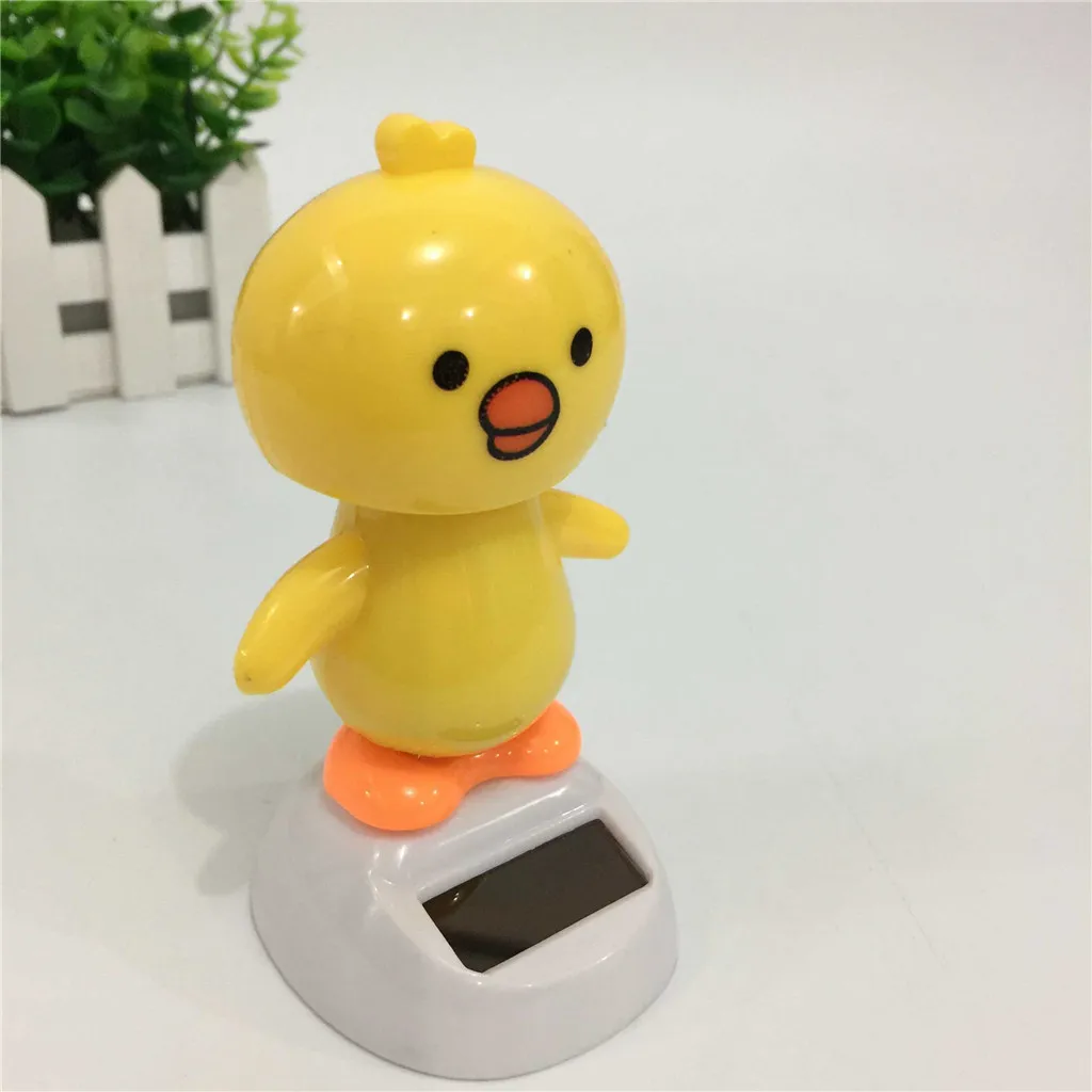 Украшение интерьера автомобиля на солнечной встряхивании голова украшения