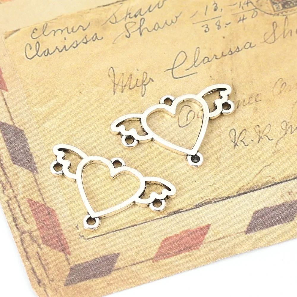 

Doreen Box Zinc Based Alloy Connectors Heart Silver Color Wing Jewelry Accessories Findings 24mm(1") x 16mm( 5/8"), 100 PCs