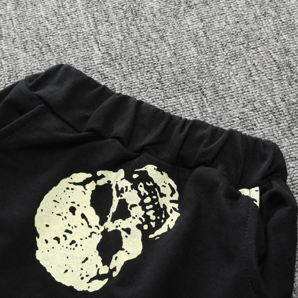 Оригинальные хлопковые детские шаровары для девочек черные с черепом весна