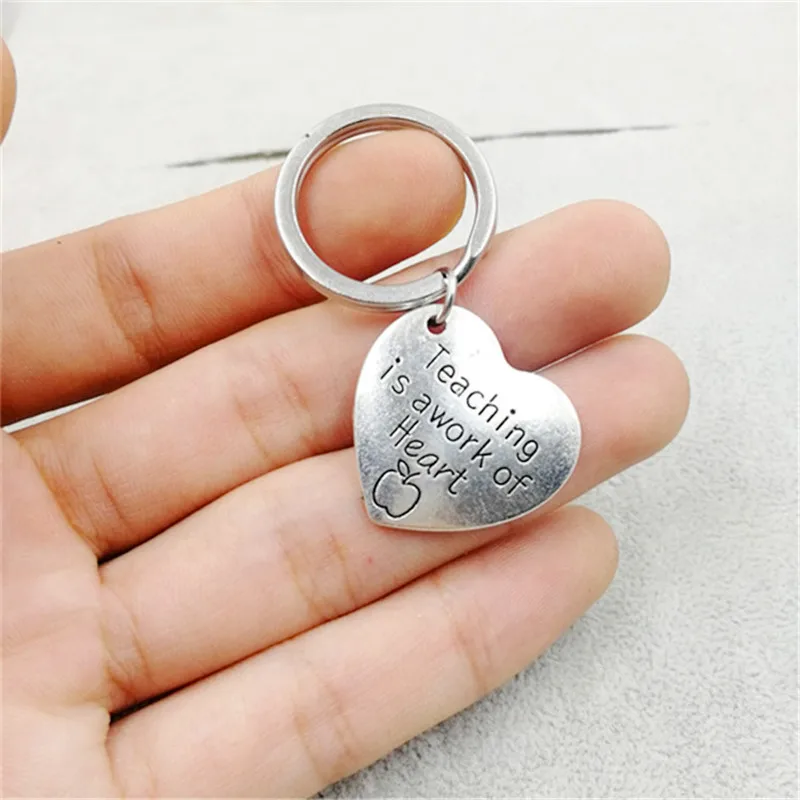 

1 Pcs Trendy Silver Color Alloy Teaching is a work of heart KeyChain Teacher Gift Jewelry