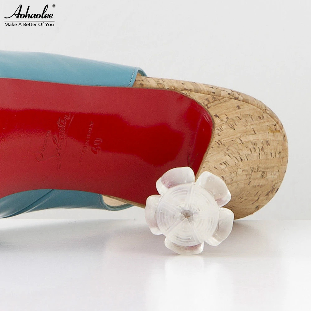 値段 100 ペア/ロット高ヒールプロテクターラテン小剣ダンスカバーヒールストッパー滑り止めシリコーン高ヒーラー結婚式の好意