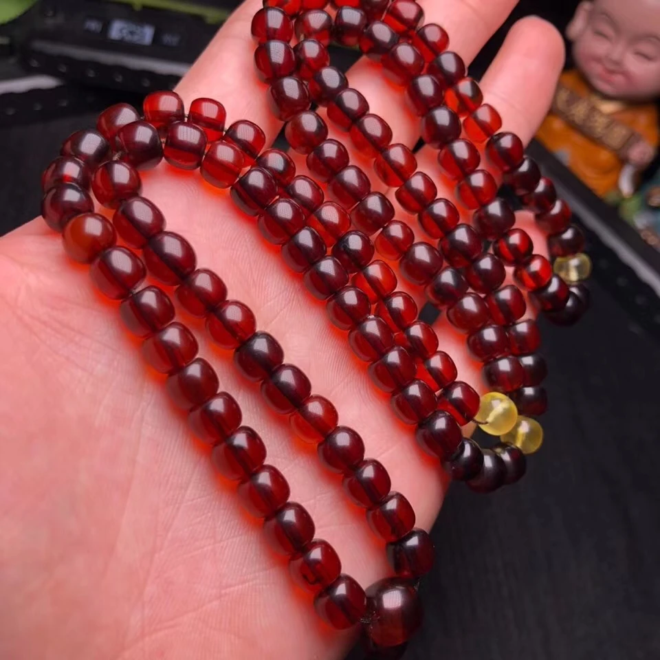Сертификат натуральный красный янтарь крови для женщин 108 молитва круглые бусины