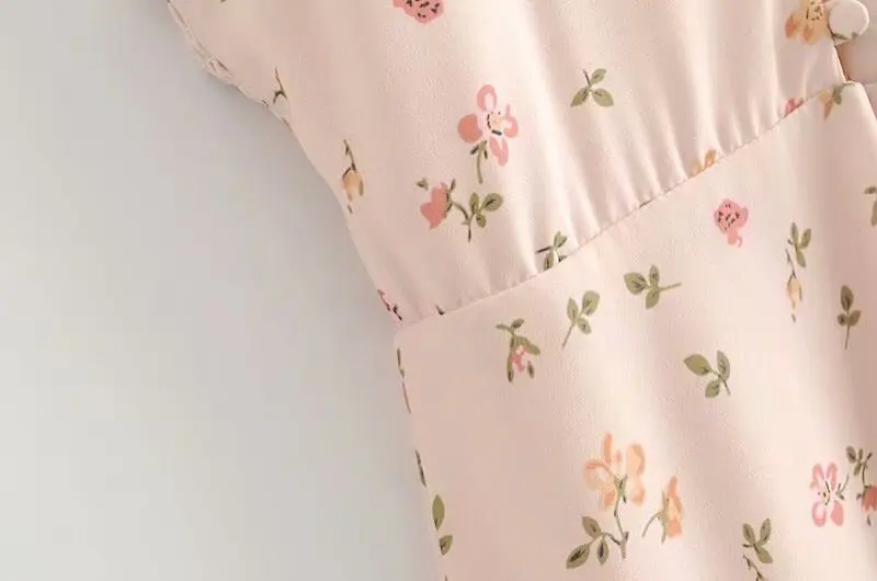 Женское платье с глубоким вырезом H. SA бежевое без рукавов цветочным принтом