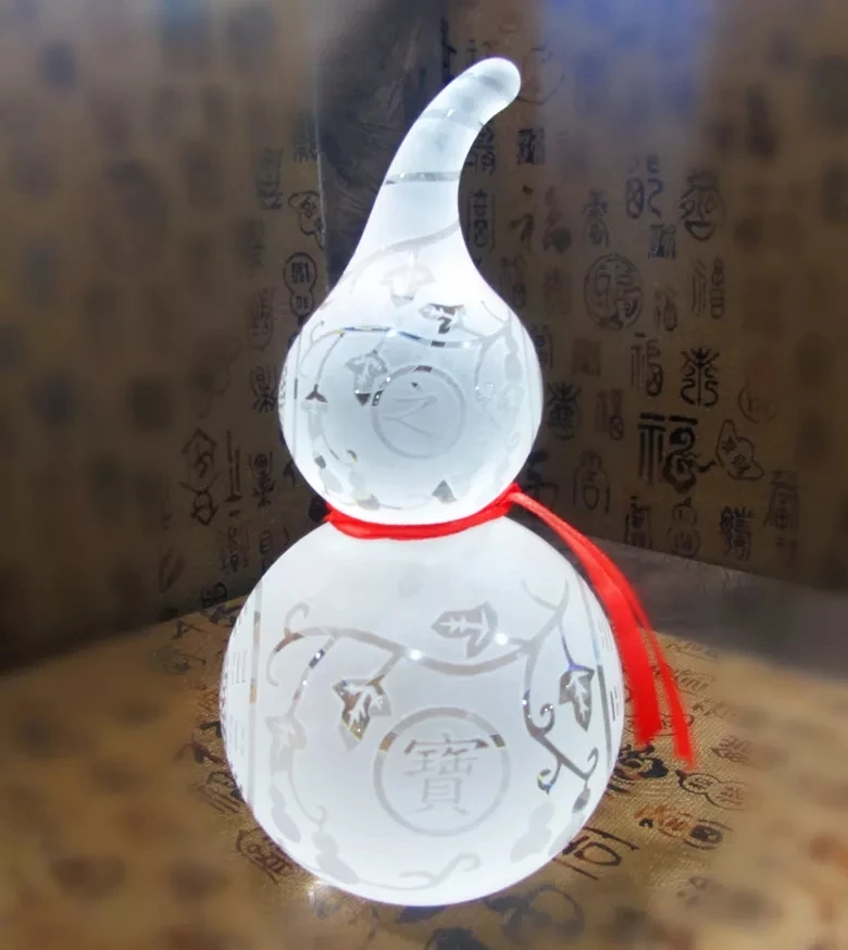 

White crystal gourd and safe gourd feng shui accessories.