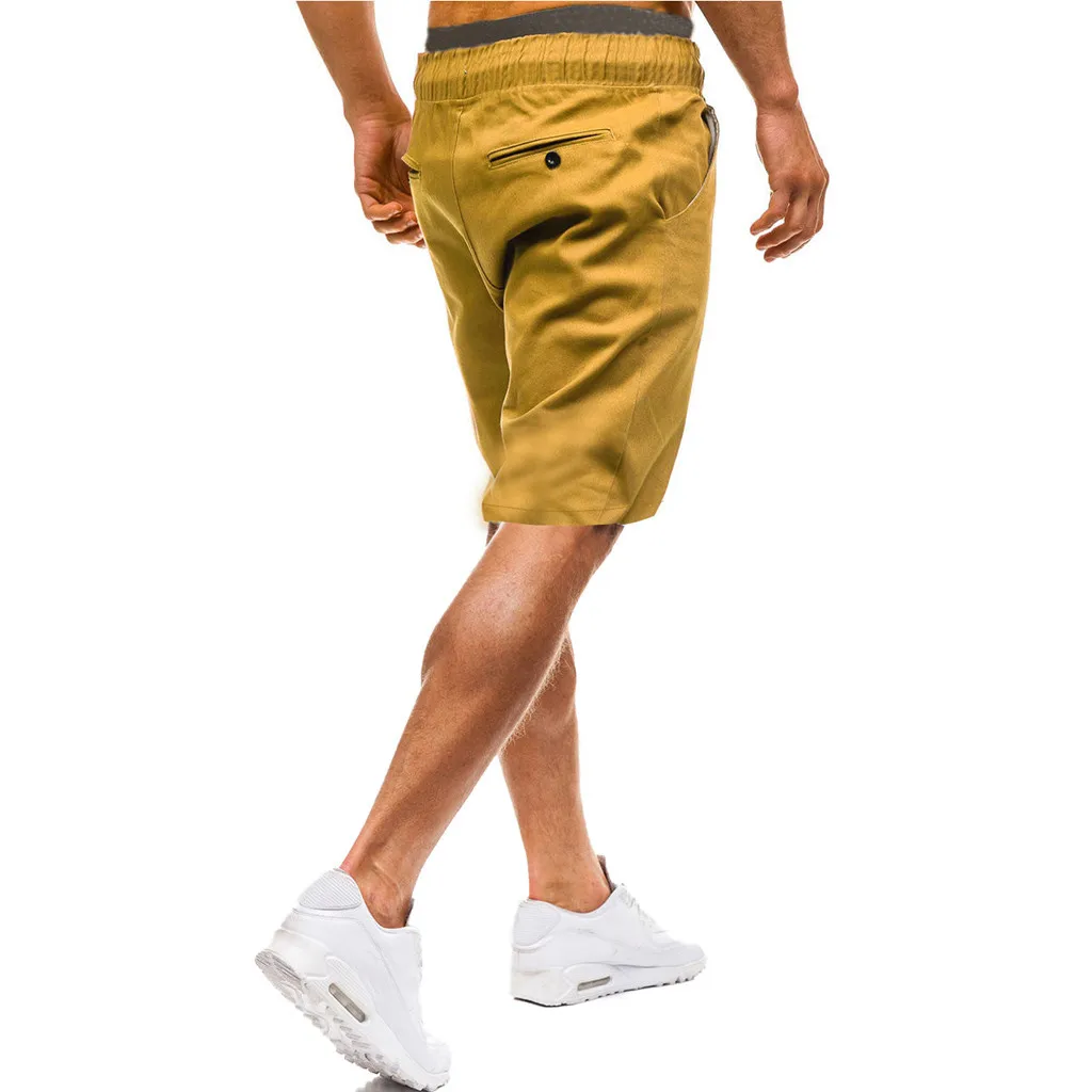 Мужские летние повседневные эластичные спортивные шорты однотонные мешковатые