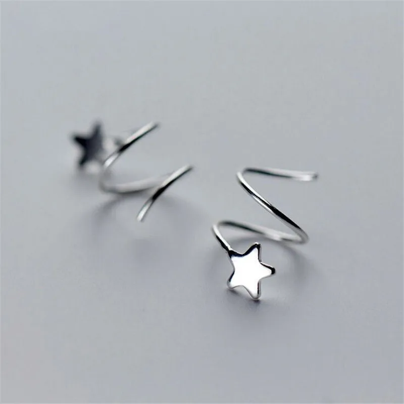 Серьги гвоздики из серебра 925 пробы в виде пентаграммы волны и