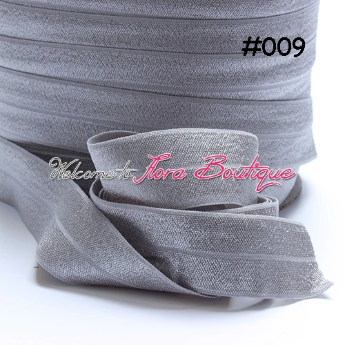 

1 inch shinny fold over elastic, #009 lt. silver, 100 yards per roll