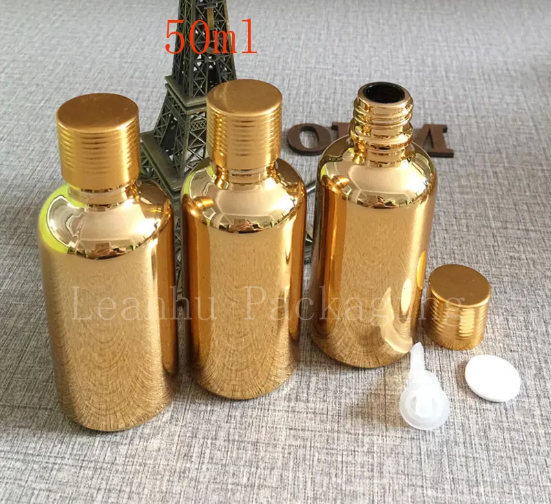 Golden 50ml glass bottle with ribbed cap wholesale imports of high-grade oil bottles bottle packing