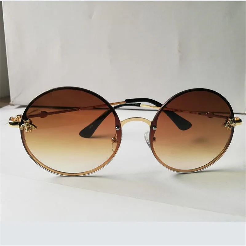 Солнцезащитные очки KAPELUS в круглой металлической оправе женские солнцезащитные