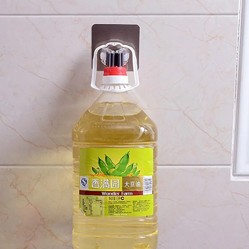 

High Quality Powerful Magic Sucker Storage Mop Wall Mounted Multi-functional Seamless Broom Mop Holder Rack Kitchen Accessories