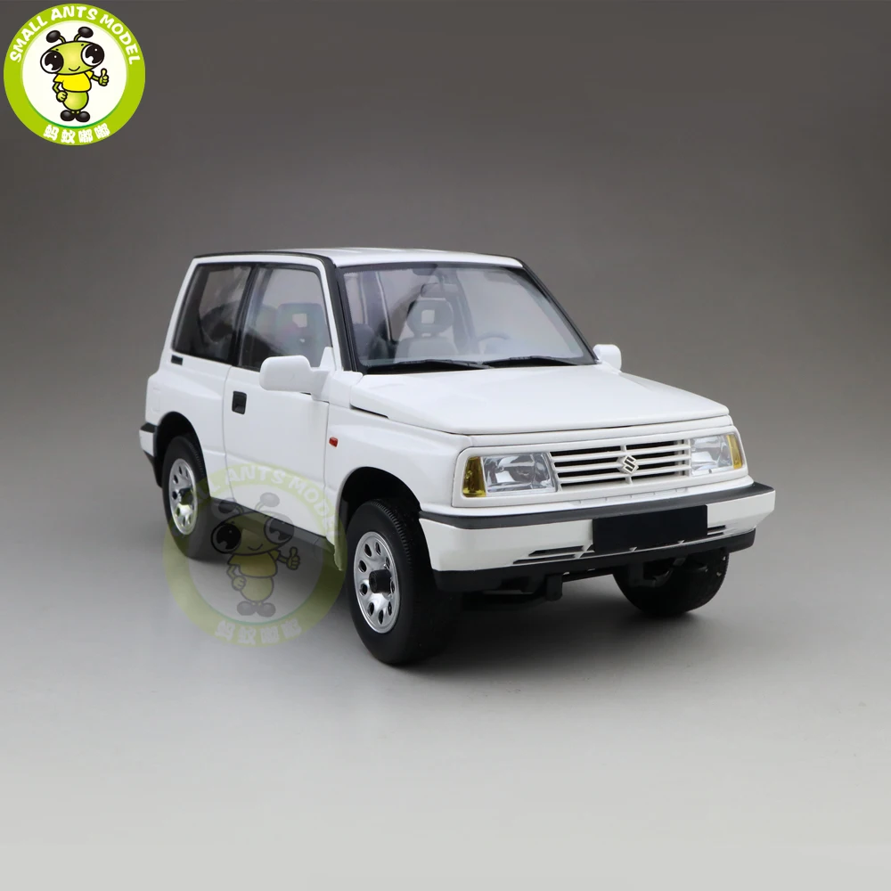 1/18 DORLOP Suzuki Vitara Escudo с левым приводом Модель автомобиля игрушки детские подарки для мальчиков девочек белого цвета