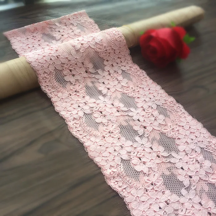 Изысканная эластичная розовая кружевная ткань с отделкой высококачественная