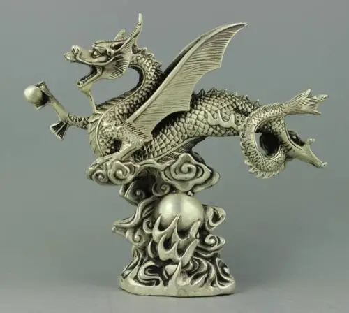 

Редкая сборная статуя тибетского серебряного дракона