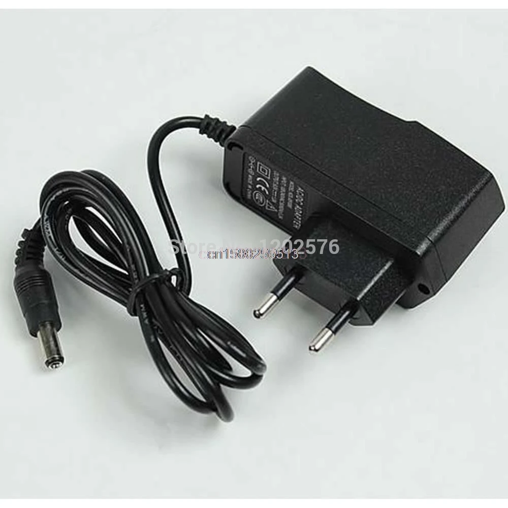 

Hot AC 100-240V to DC 9V 1A Switching Power Supply Converter Adapter EU Plug