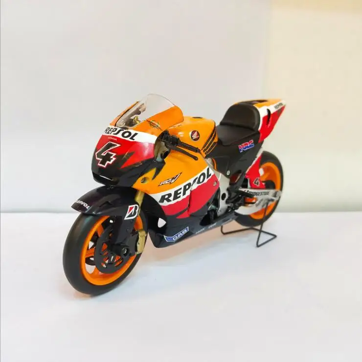 GP трек версия мотоцикла Тяньцзинь модель 4 литая машины RC211V HONDA2006 оранжевый 1/12 |