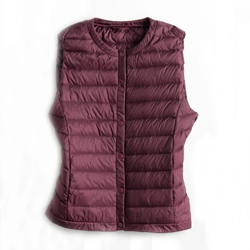 Женский жилет на утином пуху ультра легкий теплый Приталенный без рукавов осень