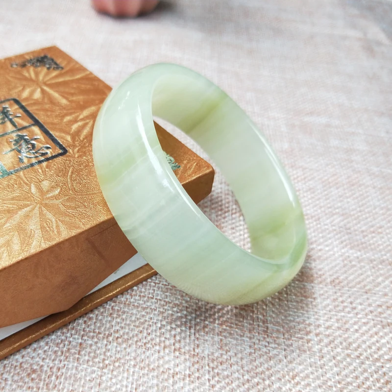 

Hand-made polished natural jade bracelet and multicolored Afghan jade bracelet to the best loved jade jewelry.