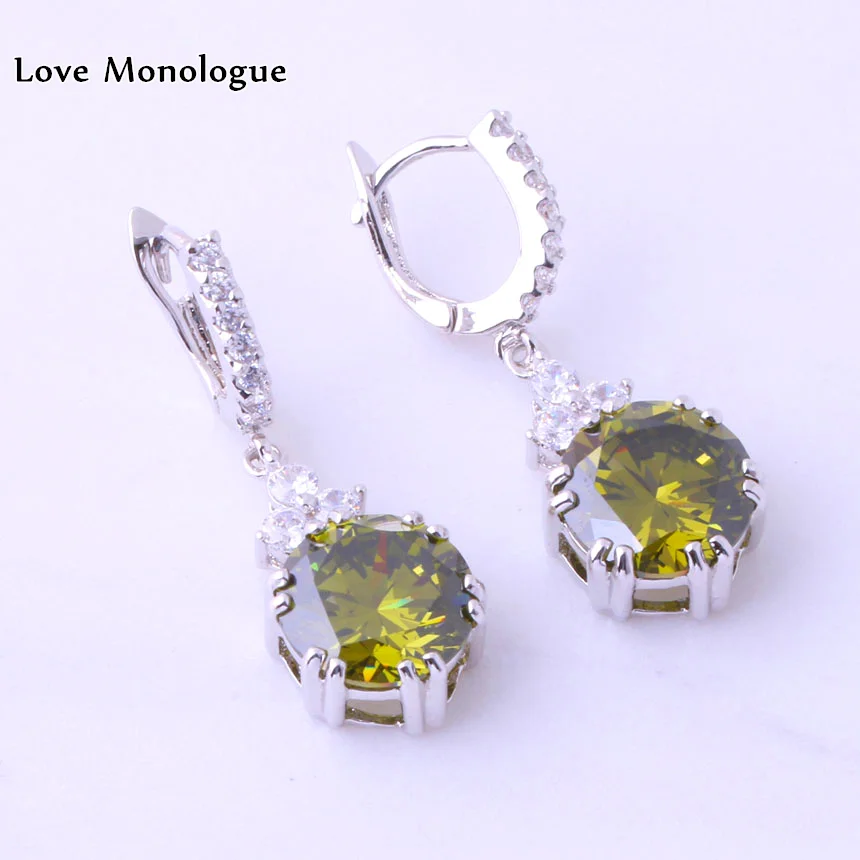 Женские серьги подвески серебряного цвета с блестящим зеленым и белым