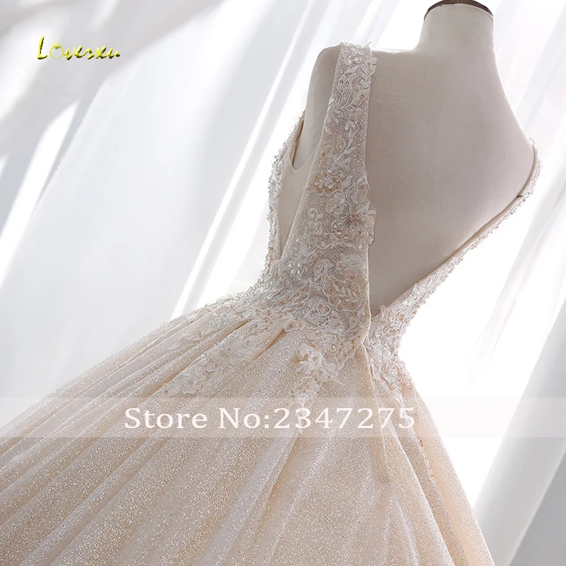 

Loverxu Vestido De Noiva Lace Ball Gown Wedding Dresses 2019 Sexy Backless V Neck Chapel Train Appliques Beaded Bridal Gown
