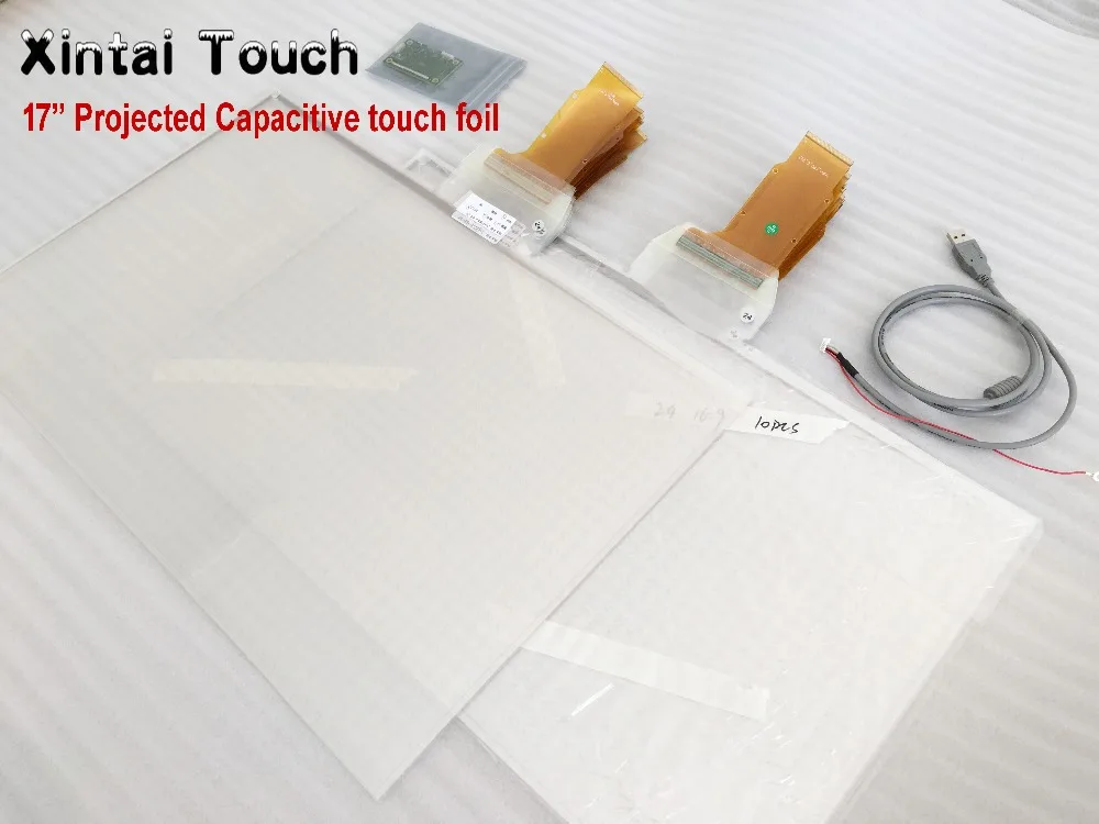 

Xintai Touch 17 inch 4 points High Quality Transparent Interactive Touch Foil for touch kiosk, table etc with 16:9 ratio