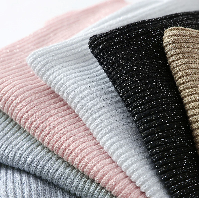 Женский трикотажный жилет с открытой спиной