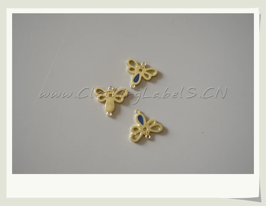 

custom metal labels for clothing, shoes, bags etc., butterfly for garment or bag decoration etc.